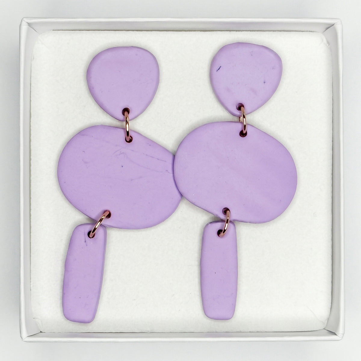 Big triple earrings purple