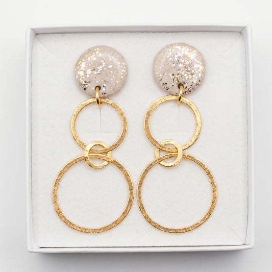 circle of love earrings beige