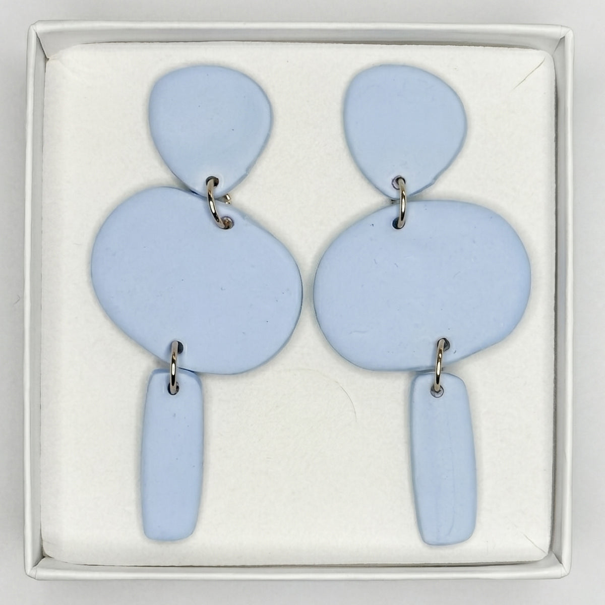 Big triple earrings light blue